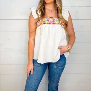 THML top. White and colorful geometric shapes. size Large. Embroidered